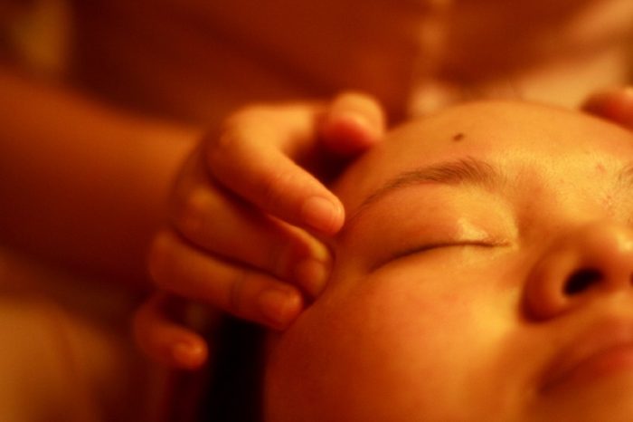 Photo of woman receiving relaxation massage